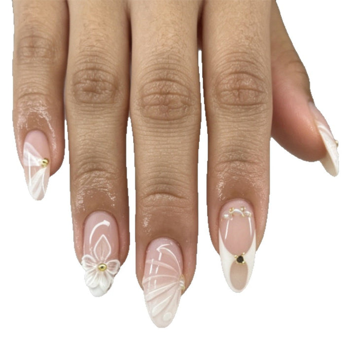 Artificial nails with elegant flower design and glitter accents Stornfield