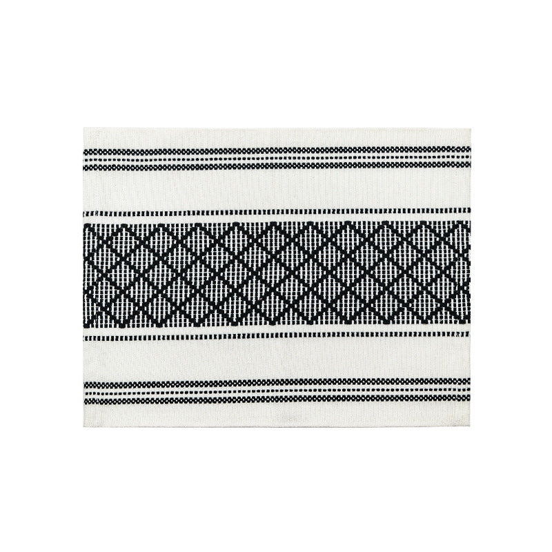Flat woven placemat with woven diamond jacquard pattern