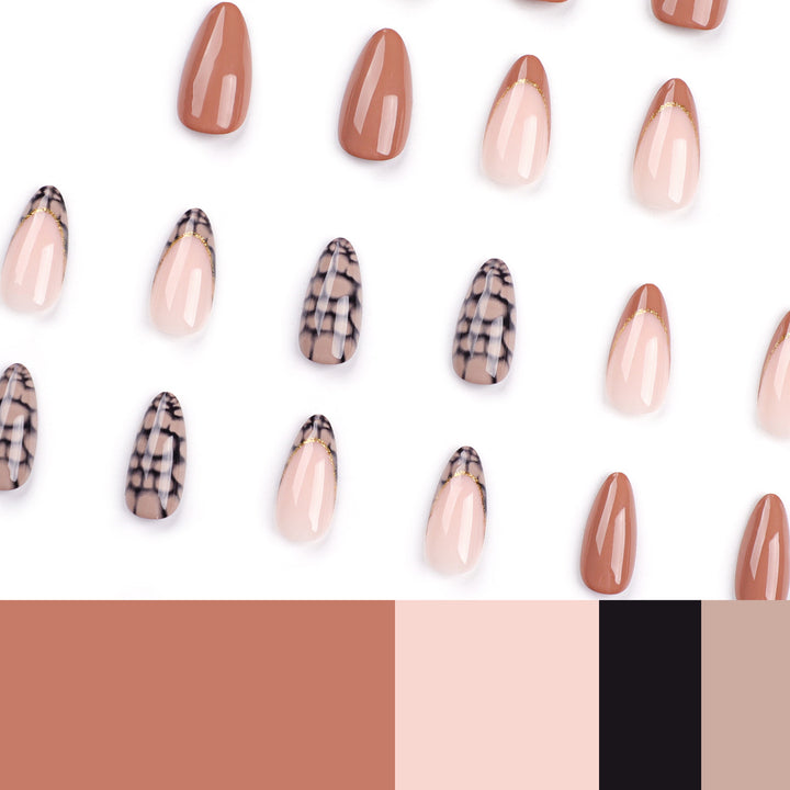 Artful stiletto nails with elegant gold decoration Stornfield