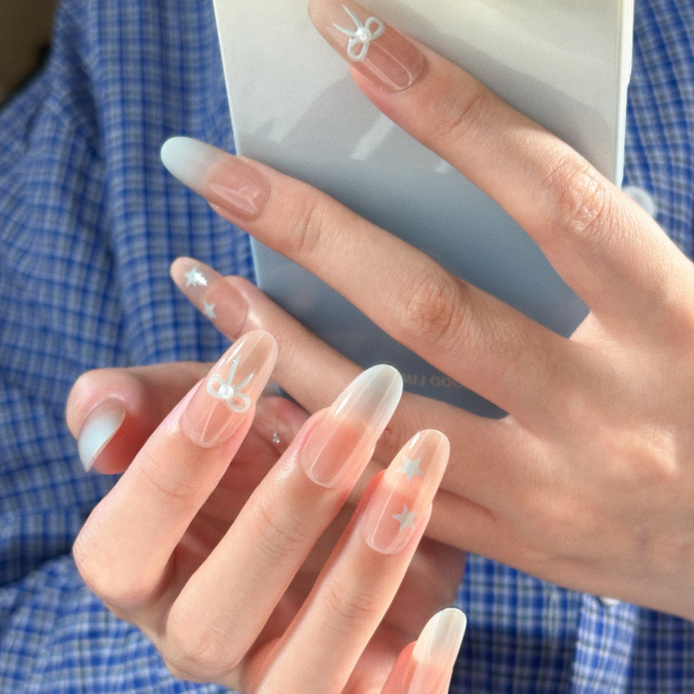 Glamorous Ombre Press-On Nail Set with Decorative Star and Bow Accents Stornfield