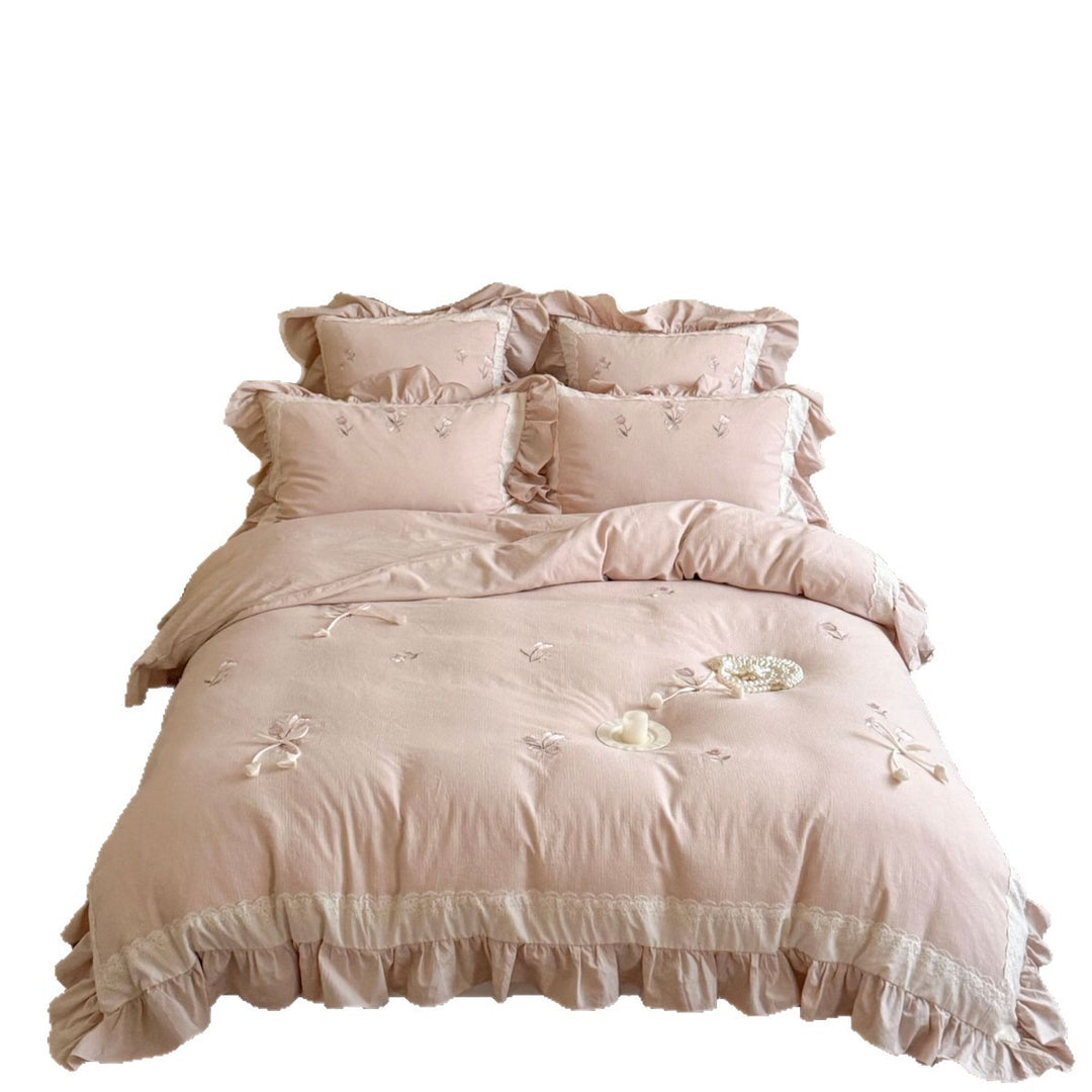 Romantic cotton bedding set with ruffles and floral embroidery