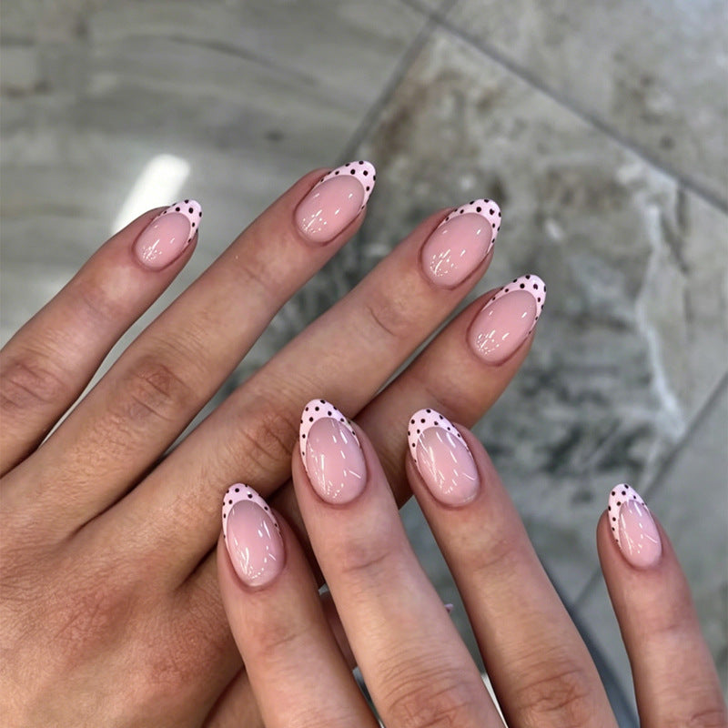 Artificial nail set with elegant tips and playful dots Stornfield