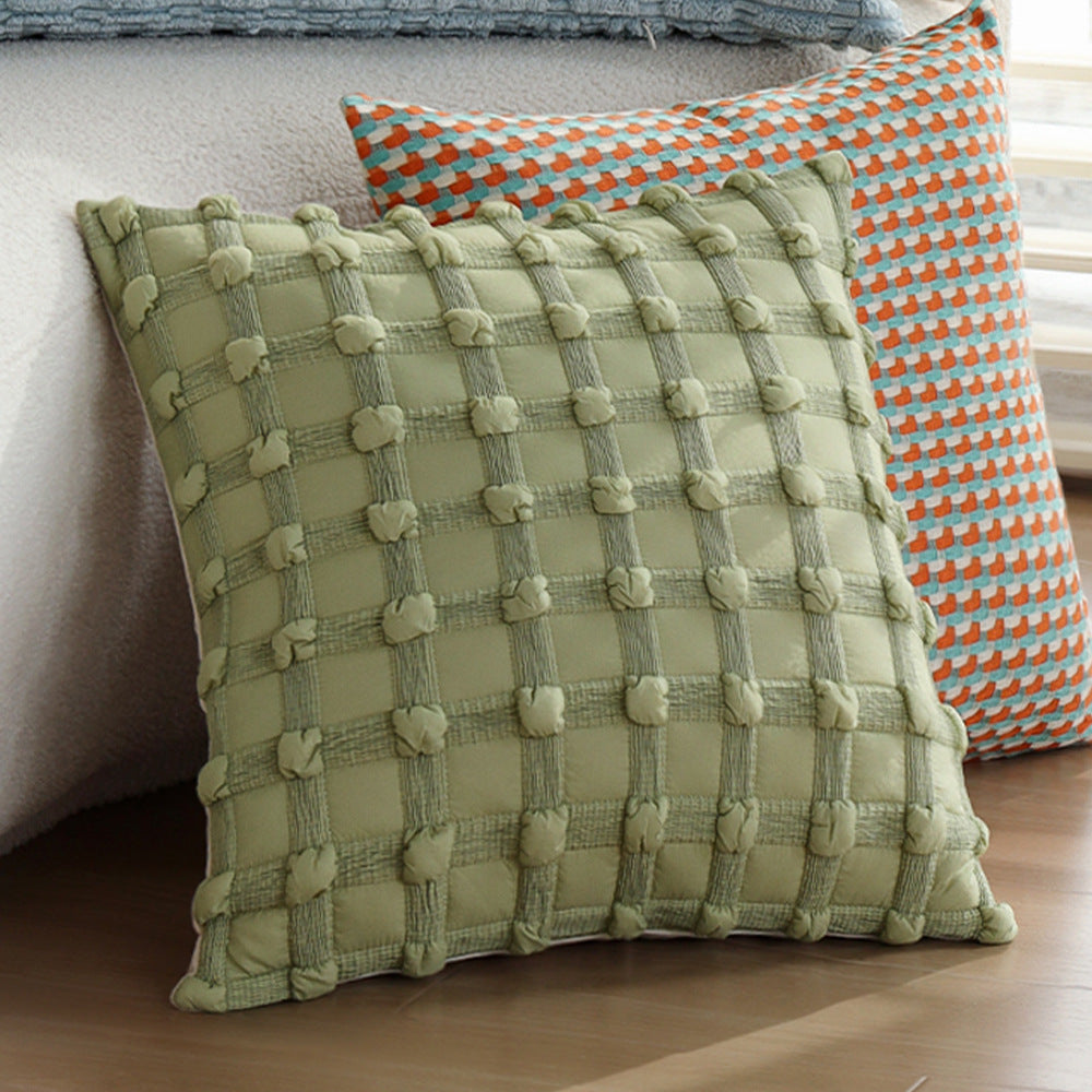 Long decorative pillows with structured surface