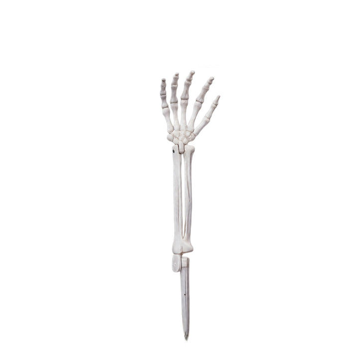 Creepy Halloween decor skeleton tree trunks Stornfield