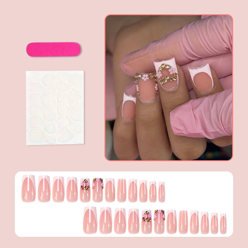Nail art set with delicate flower and glitter accents Stornfield