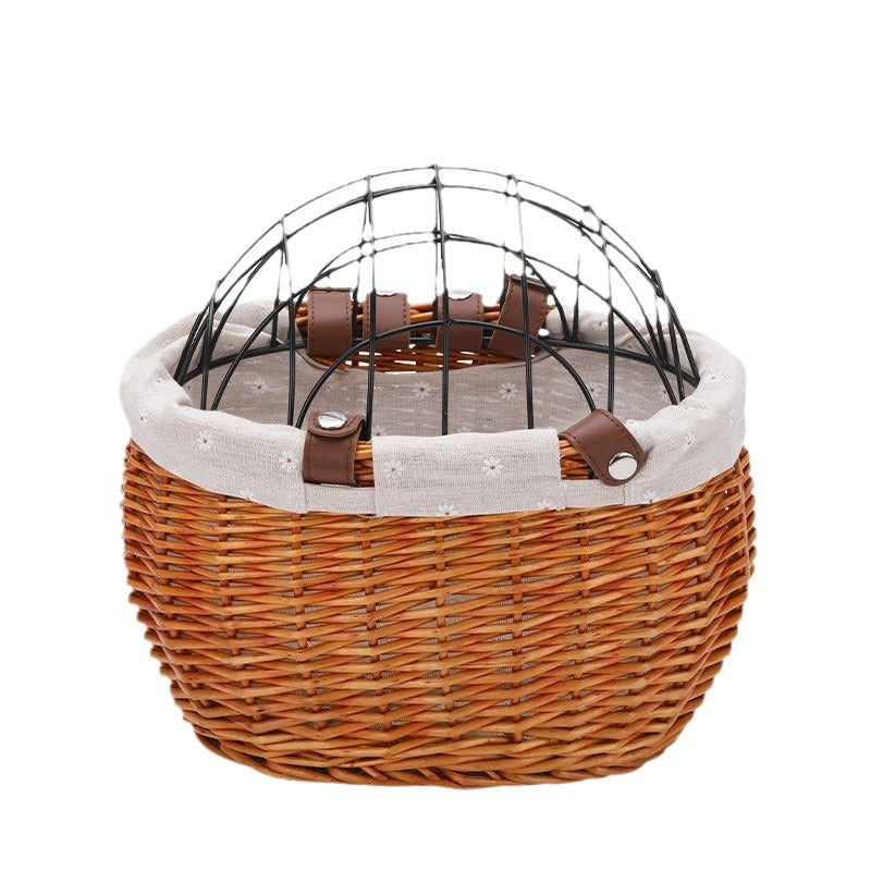 woven rattan pet carrier basket with detachable linen liner and foldable metal safety dome Stornfield