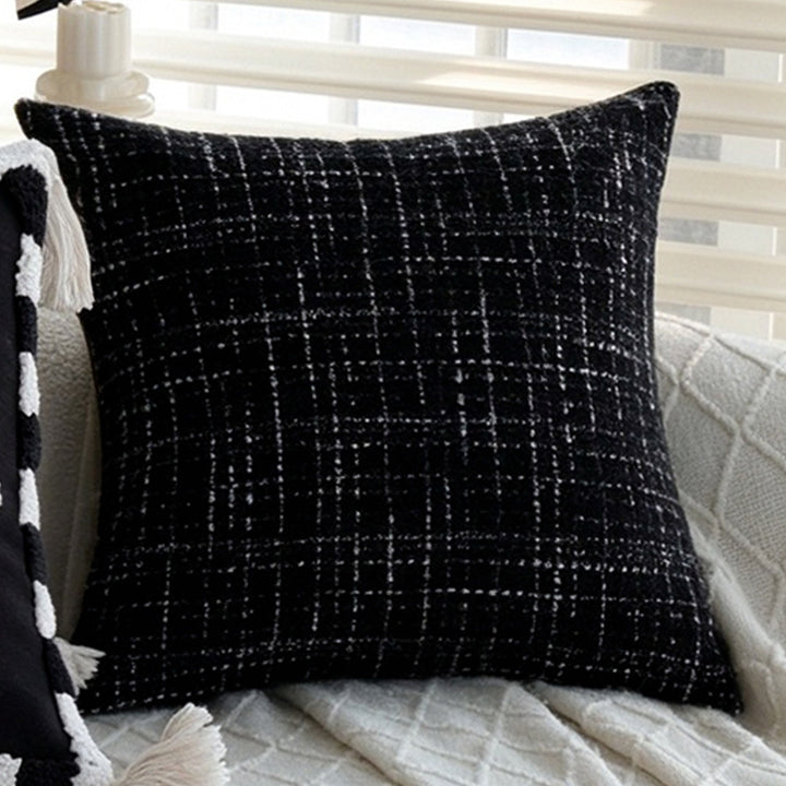 Cozy decorative cushion with modern check pattern