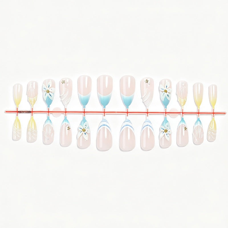Art nail set with elegant flower design and stylish color gradients Stornfield