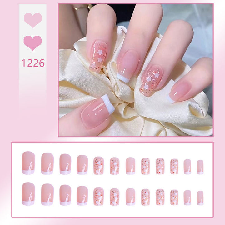 Nail art set with floral decorations and elegant French design Stornfield