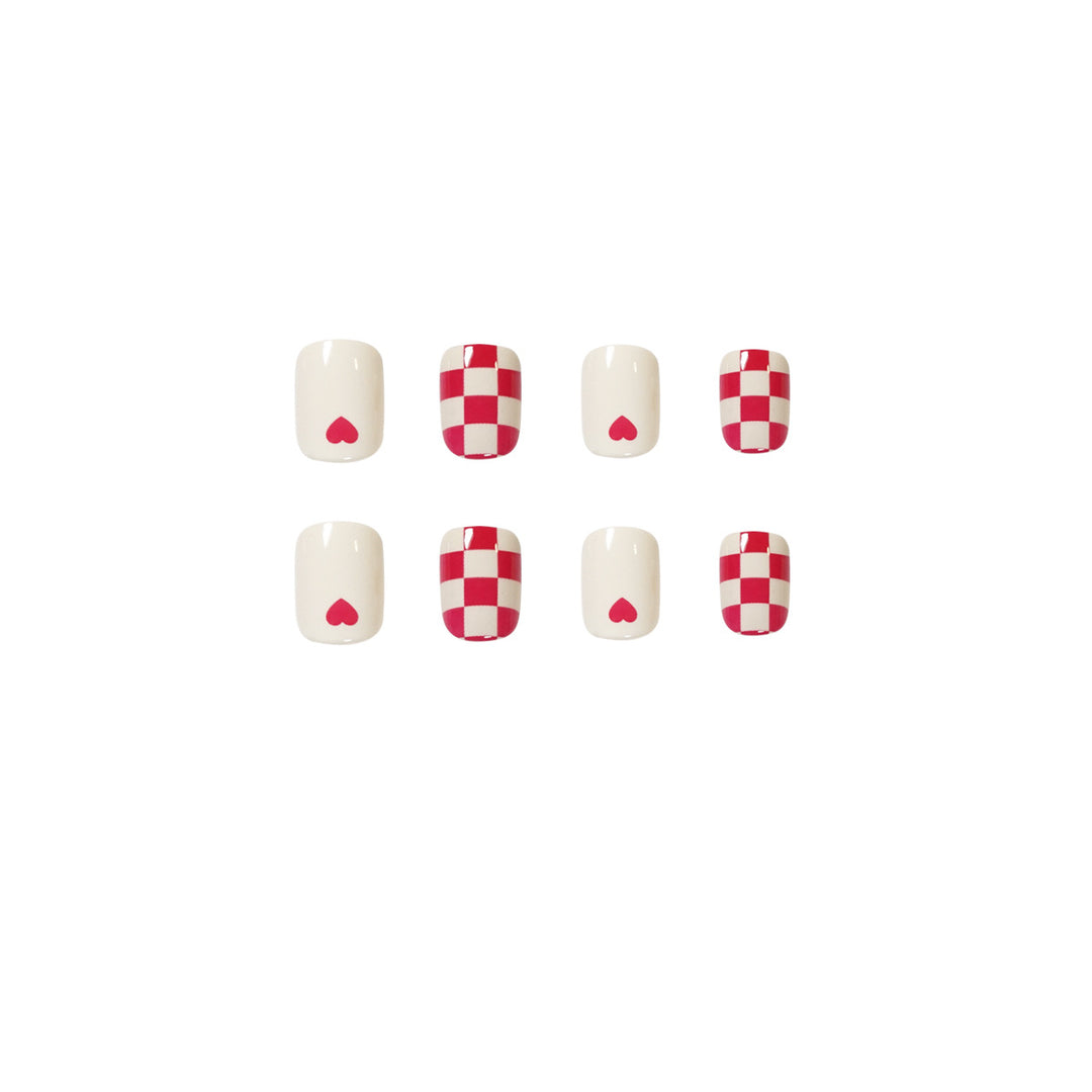 Trendy Nail Art with Heart and Checkered Patterns Stornfield