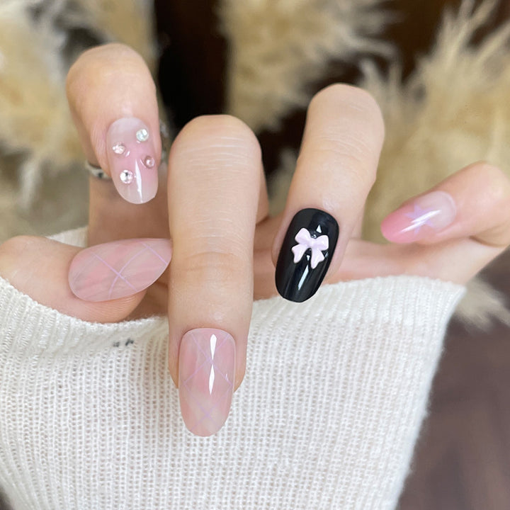 Artistic Nail Extensions with Decorative Elements Stornfield