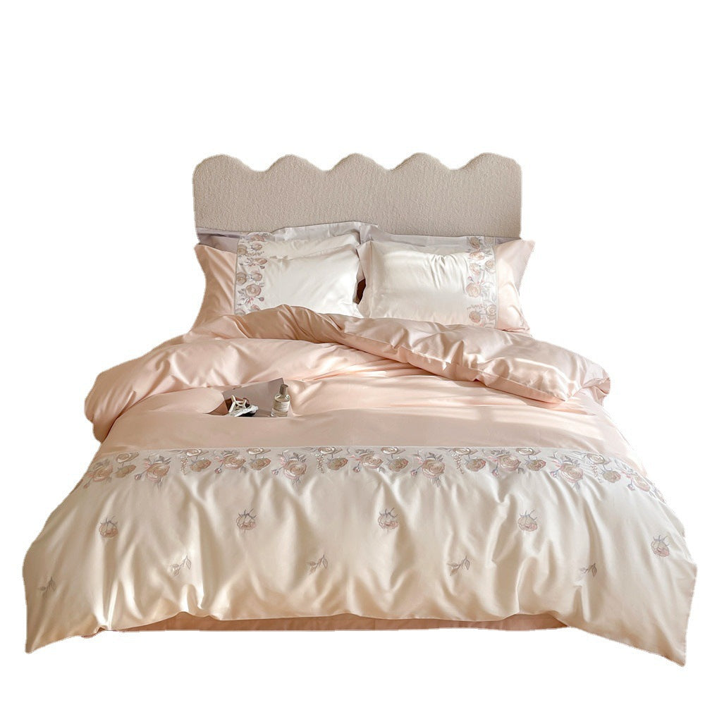 Premium bedding set made of cotton satin with floral border embroidery and reversible function
