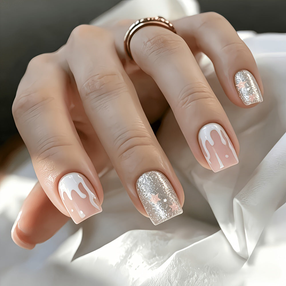 Glittering artificial nails with playful drop design Stornfield
