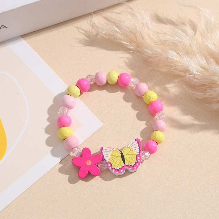 Playful bracelet with heart and butterfly charms Stornfield