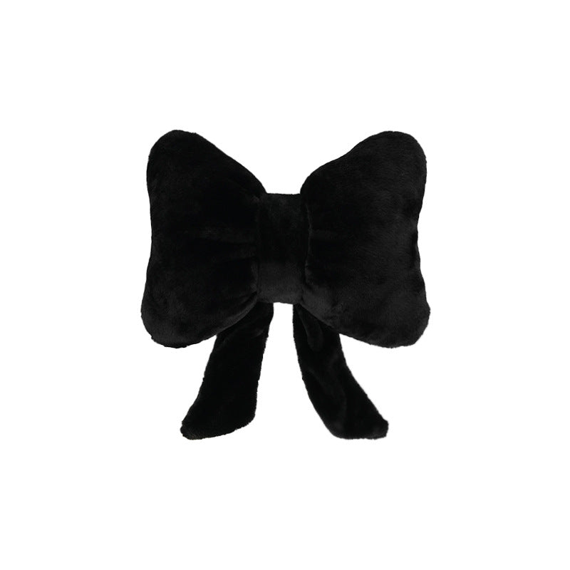 plush bow-shaped decorative throw cushion with long tails and faux-fur texture Stornfield