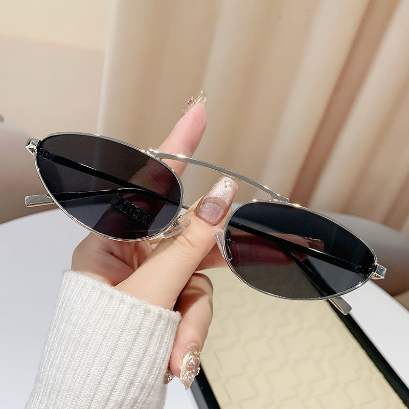 Ladies fashionable sunglasses in elegant oval design Stornfield
