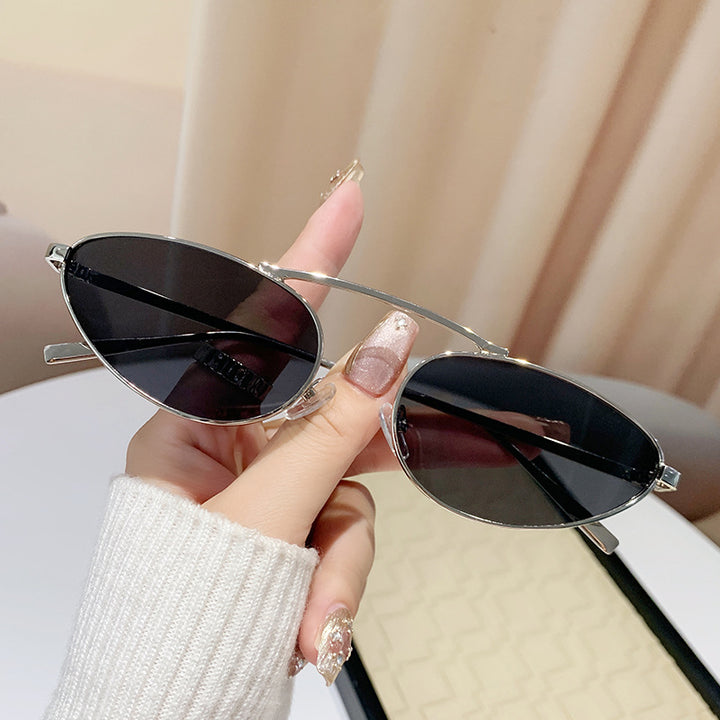 Ladies fashionable sunglasses in elegant oval design Stornfield