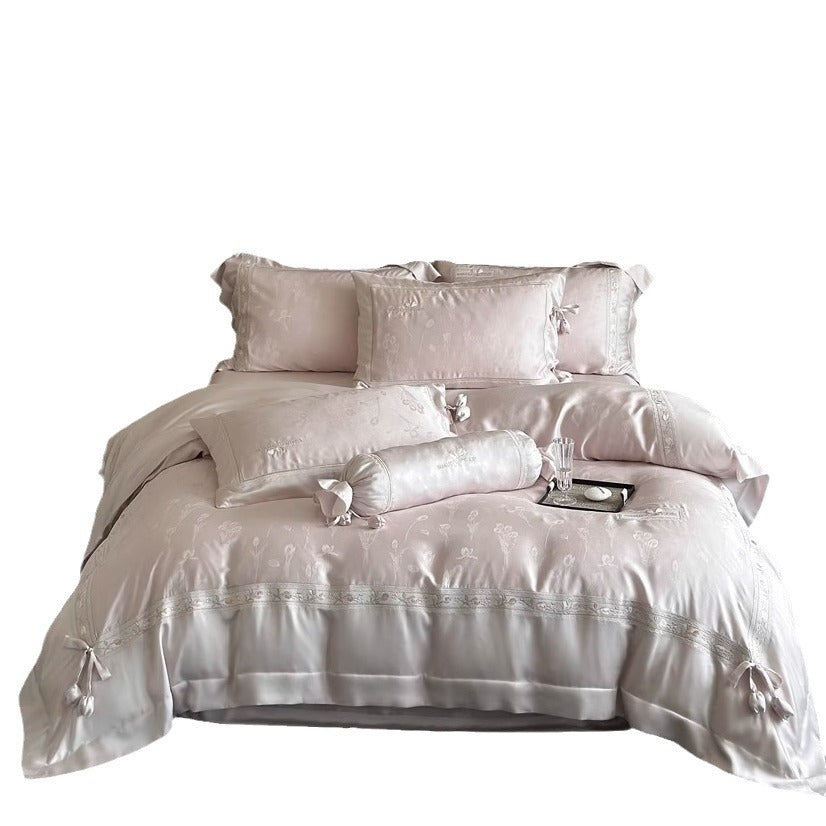 Premium Silk-Blend Floral Embroidered Bedding Ensemble with Bolster and Tie-Trim Pillow Shams