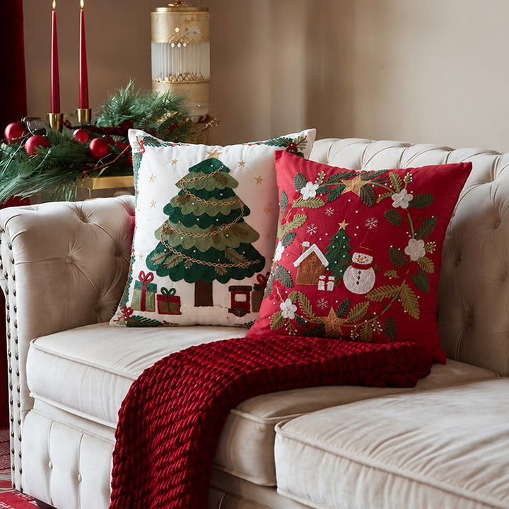 Festive embroidered decorative pillow with reindeer motif and removable cover