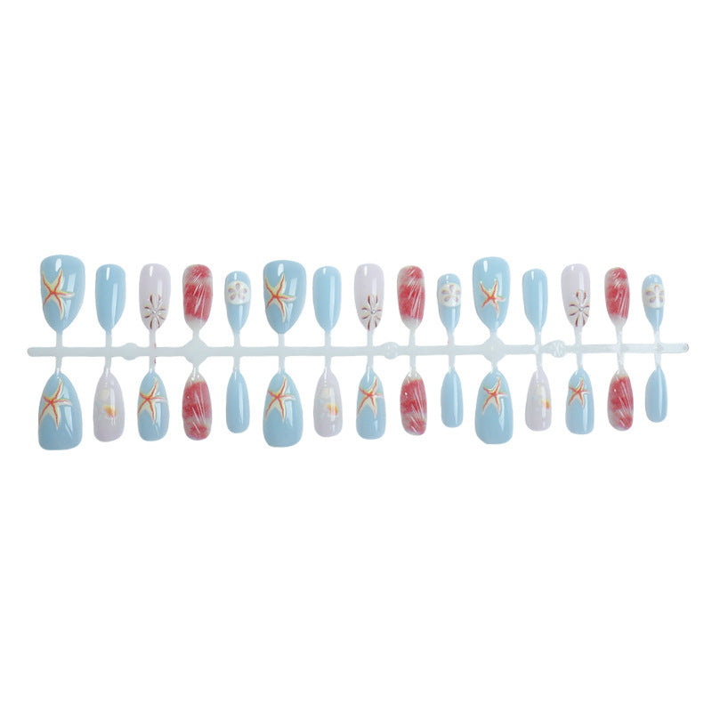 Artificial nails with maritime shell motifs Stornfield