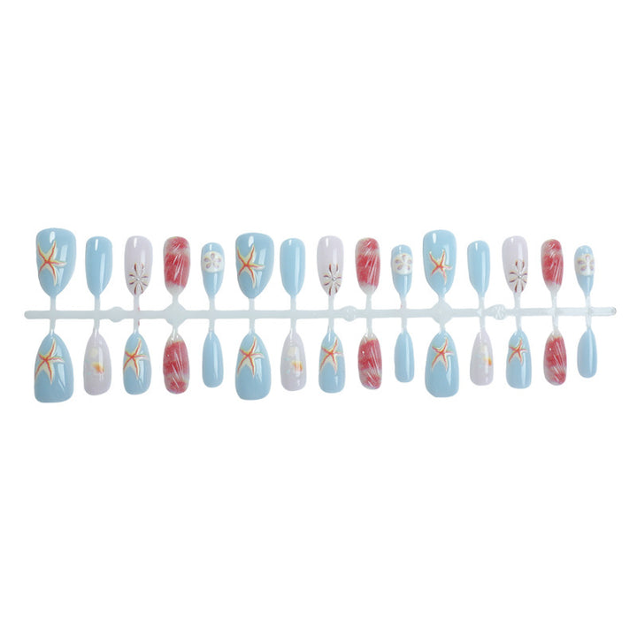 Artificial nails with maritime shell motifs Stornfield