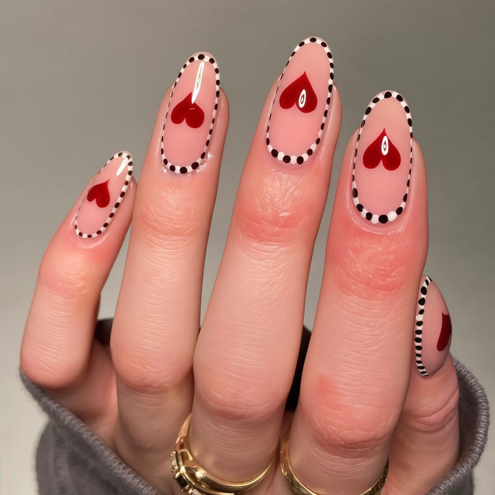 Artificial nails with heart-shaped accents Stornfield