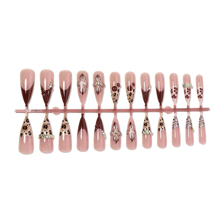 Elegant artificial nail set with 3D flowers and luxurious accents Stornfield