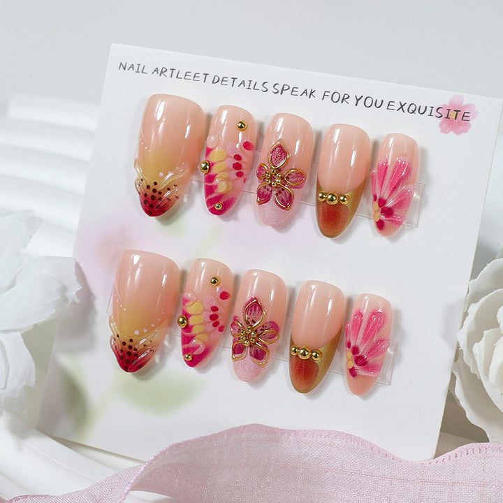 Artificial nail set with floral accents and sparkling details Stornfield