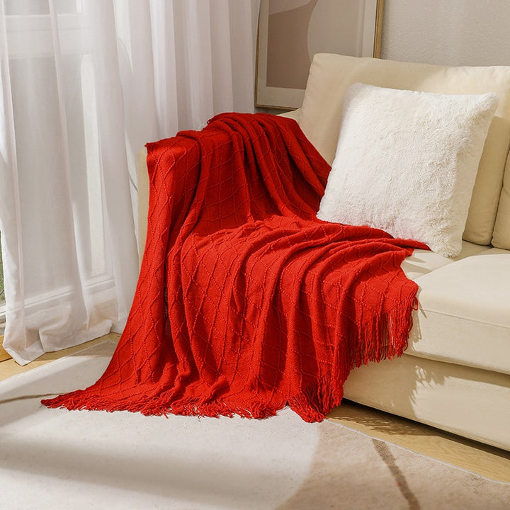 Women’s knitted blanket with textured wave pattern Stornfield