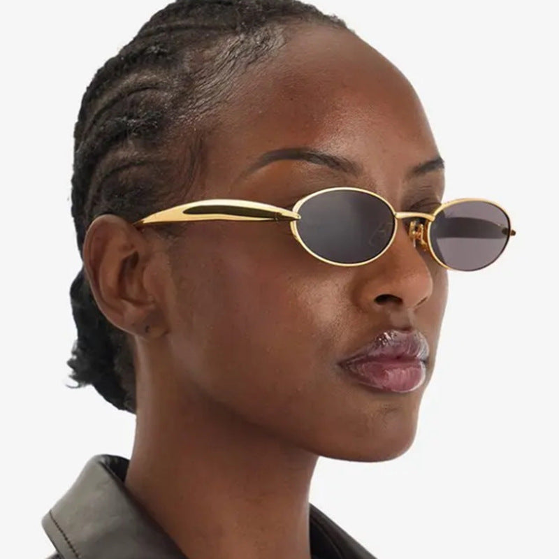 Women's fashionable sunglasses with oval frame and sparkling details Stornfield