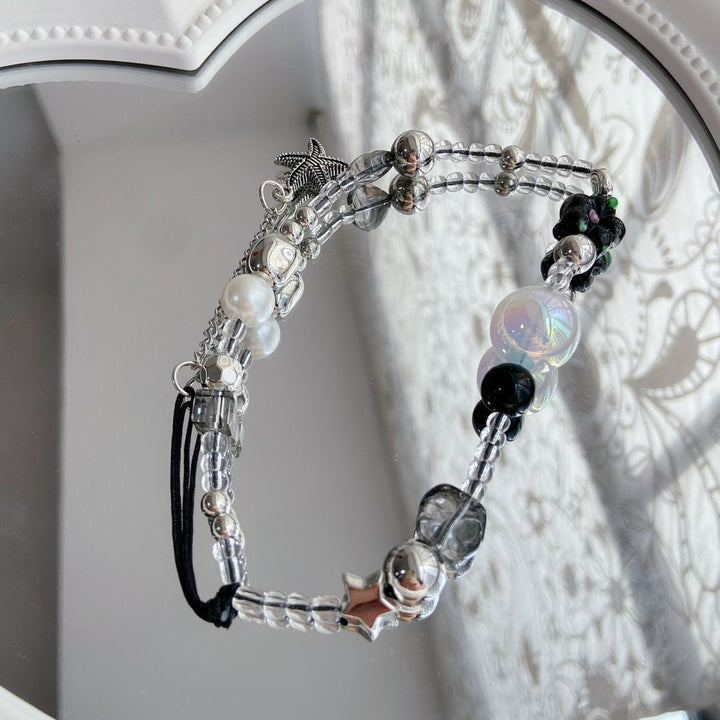Elegant Beaded Charm Eyewear Holder Stornfield