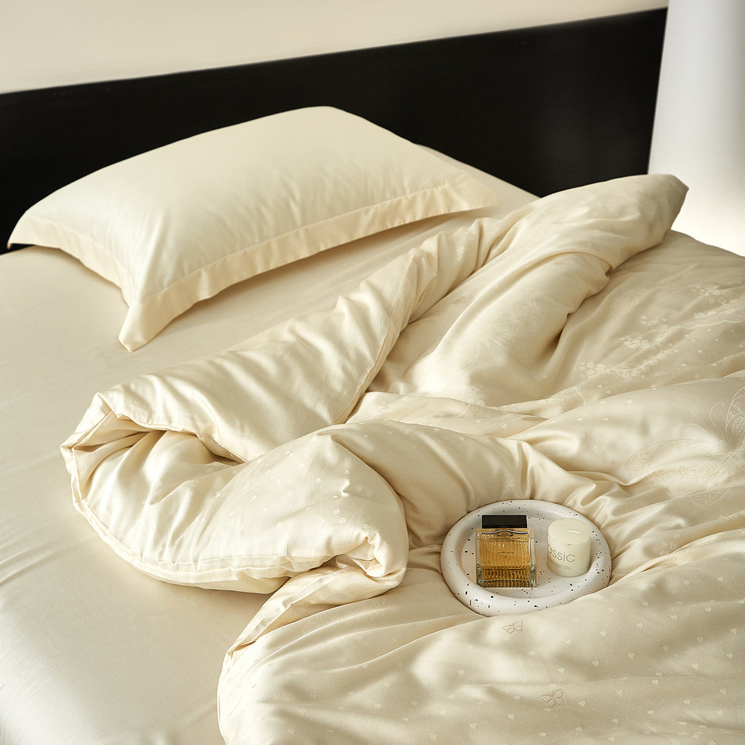 Satin bedding set with silky feel, hotel closure and tone-on-tone pattern