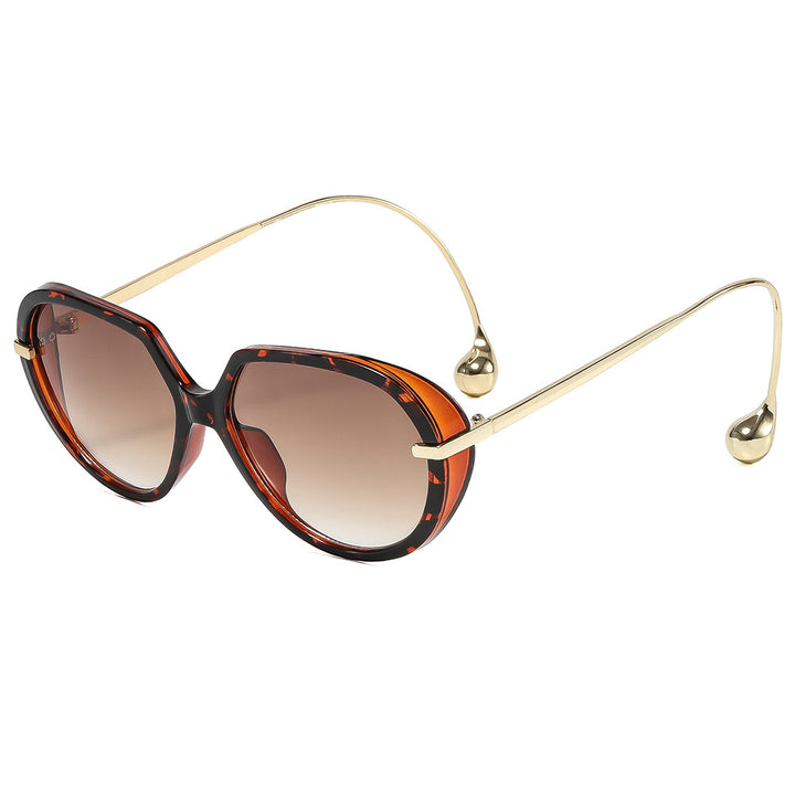 Women's Cat-Eye Sunglasses with Golden Accents and Stylish Frame Stornfield
