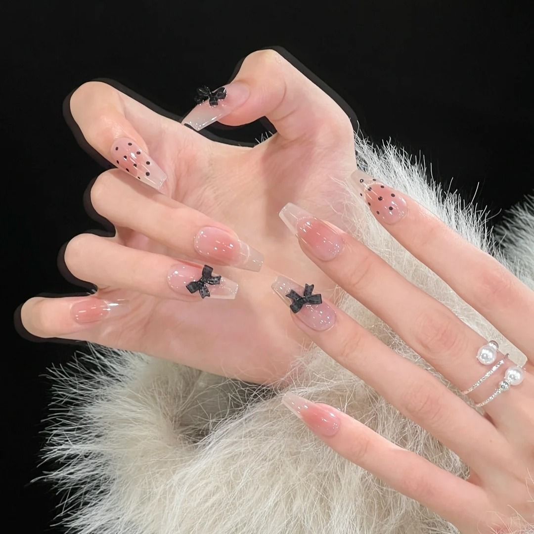 Artistic Long Stiletto Press-On Nails with Bow Accents Stornfield