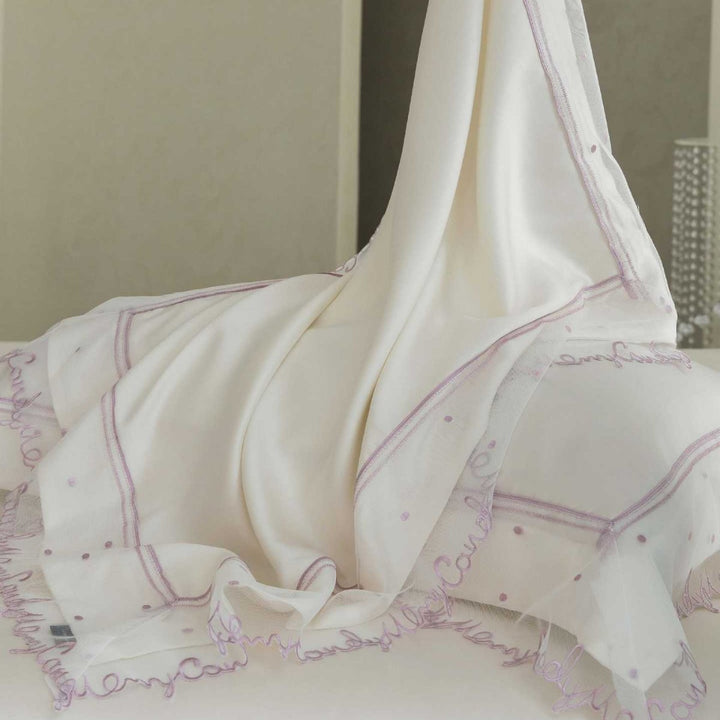 Satin bed linen set with delicate organza ruffle and lace trim