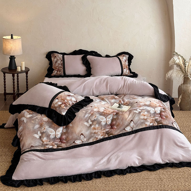 Satin bedding set with ruffle trim and floral butterfly design