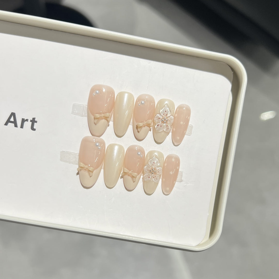 Decorative Press-On Nail Art Set with Bow and Floral Embellishments Stornfield