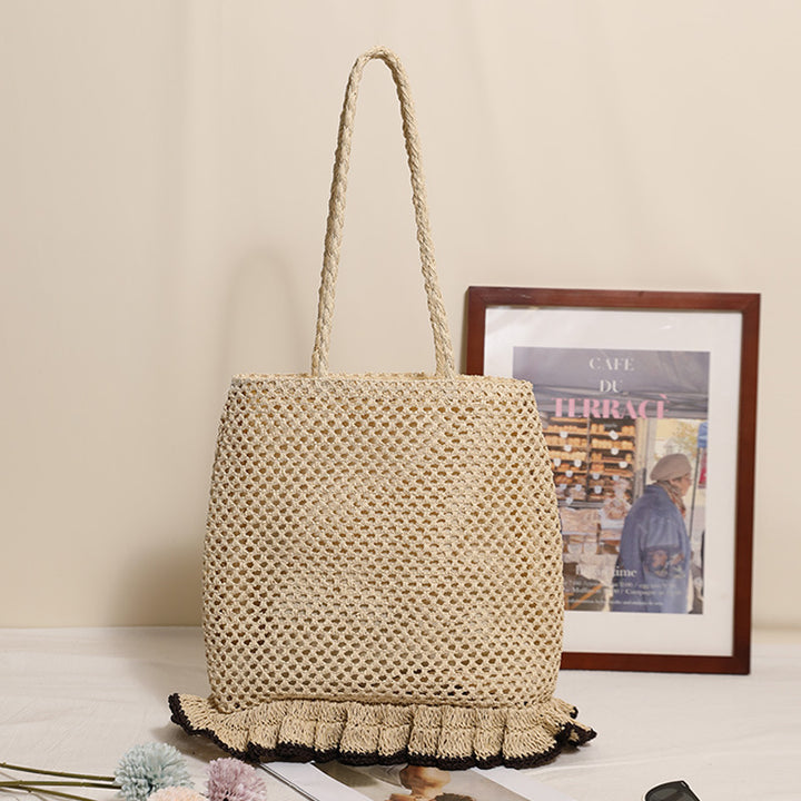 Handcrafted straw bag with fringed hem Stornfield