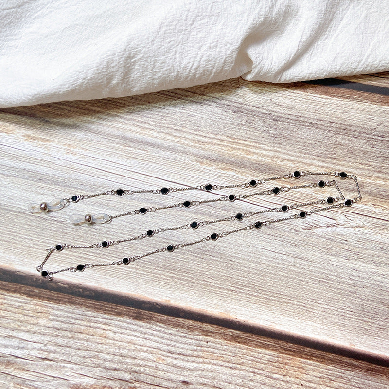 Elegant jewelry holder chain with onyx beads Stornfield
