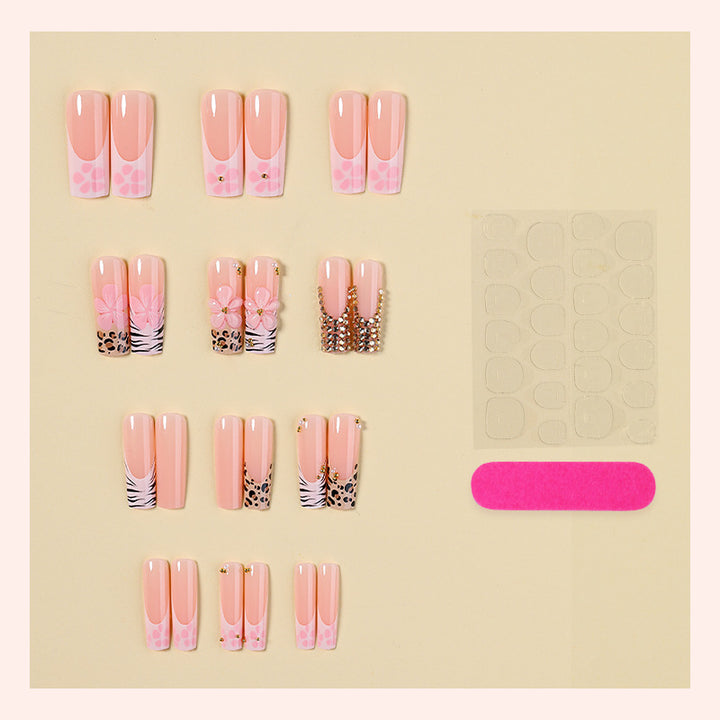 Artificial nail set with rhinestone accents Stornfield