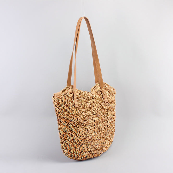 Casual bag made of handwoven straw with wide leather handles Stornfield