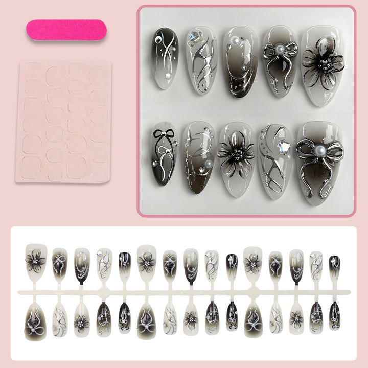 Artificial nails with elegant floral and glittering decorations Stornfield
