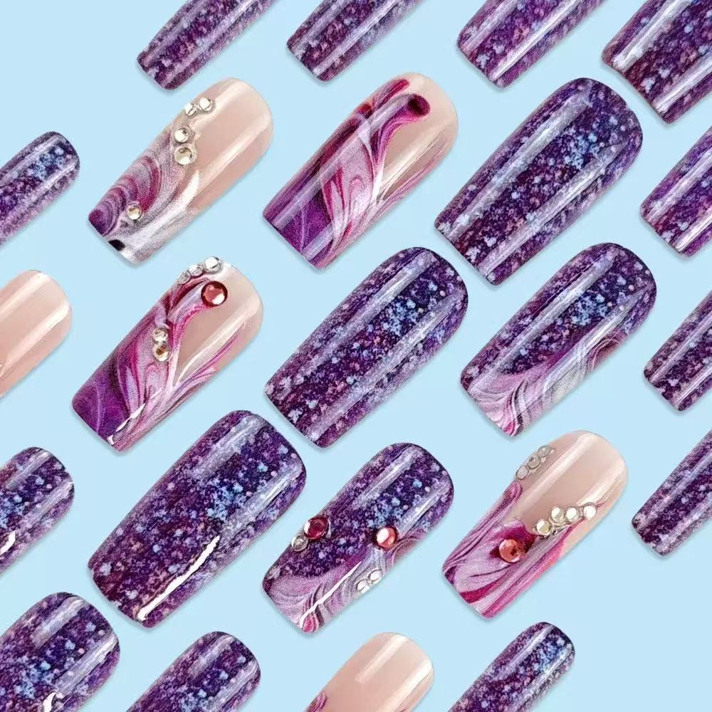 Acrylic nail set with luxurious color gradients and sparkling accents Stornfield