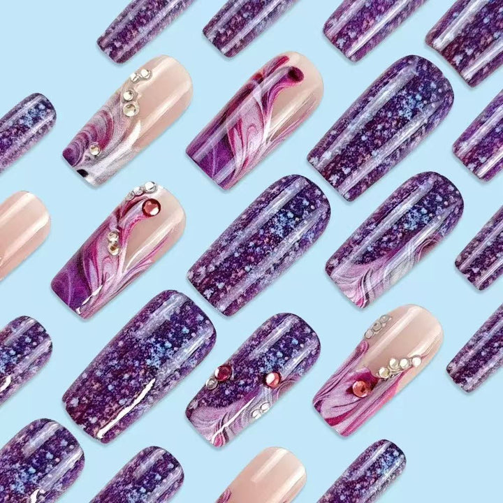 Acrylic nail set with luxurious color gradients and sparkling accents Stornfield