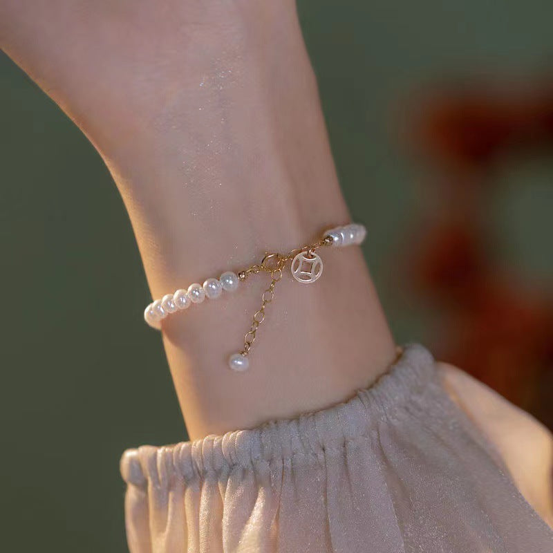 Elegant Pearl Charm Bracelet Stornfield