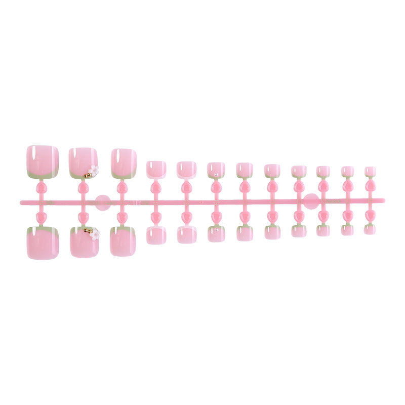 Nail art set with delicate flower designs and glossy finish Stornfield