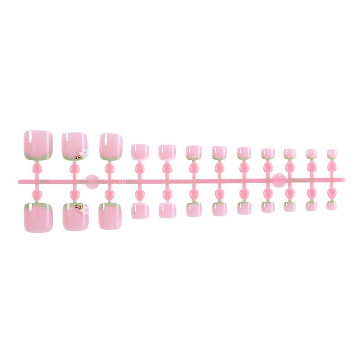 Nail art set with delicate flower designs and glossy finish Stornfield