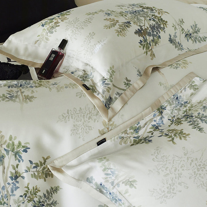 Luxurious cotton satin bedding set with fine botanical branch pattern and silky-soft touch