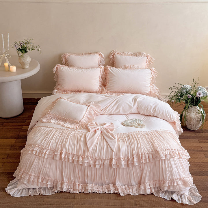 Romantic ruffled velvet bed set with pleated frills and decorative cushions