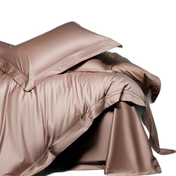 Exclusive cotton satin bedding set with a silky touch, double seam piping, and hotel closure